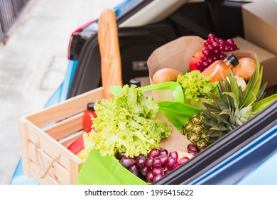 Grocery Service Giving Fresh Vegetables And Fruits And Food In Green Cloth Bag And Wooden Basket On The Back Car Ready Delivery To Send Woman Customer