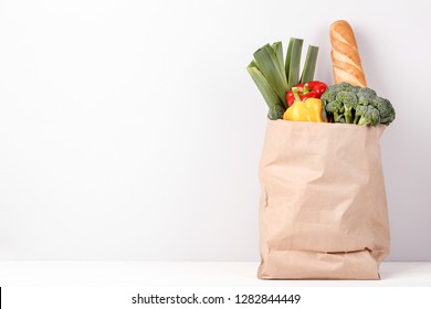 Grocery Shopping Bag With Food On Grey Background