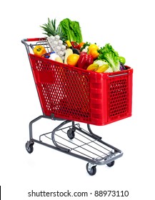 Grocery shopping cart with food. Isolated over white background.
