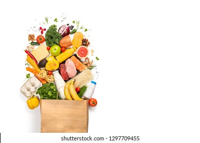 Grocery shopping concept - meat, fish, fruits and vegetables with shopping bag, top view - Shutterstock ID 1297709455