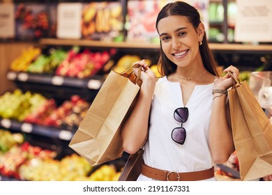 Grocery Shopping, Food And Diet With A Young Woman In A Retail, Convenience Store Or Grocer And Fruit And Vegetables In The Background. Portrait Of A Female With Paper Bags In A Fresh Produce Aisle