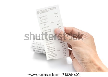 Grocery shopping list or receipt in hand - money account management concept