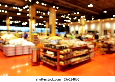 Grocery store blur bokeh background - shoppers at grocery store with defocused lights - Shutterstock ID 356224865