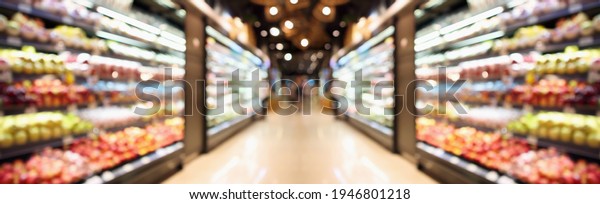 Grocery store shelves with fruits and\
vegetables blurred\
background