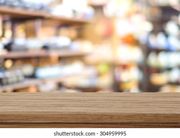 Grocery Store Table, Empty Wooden Shelf, Counter Over Blur Product Shelves In Supermarket With Bokeh Background, Store Product Display Montage, Shop Mockup, Template Poster Banner, Business Background