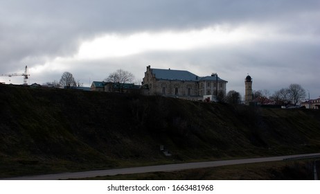 Grodno. Belarus. Evening Landscape. The Building Of The Synagogue, Fire Tower And Old City Houses Are Visible On A High Hill Against The Evening Sky
