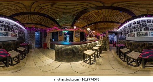 GRODNO, BELARUS - NOVEMBER, 2018: Full spherical seamless panorama 360 degrees in interior stylish nightclub bar in basement with arches in equirectangular equidistant projection. VR content 
