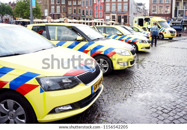 Groningen, The Netherlands, JUNE\
16, 2016: Many ambulance cars of emergency medical services parked\
on the center of Groningen, Grote Markt, in The Netherlands,\
Europe
