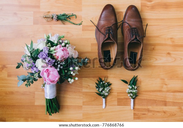 shoes with flowers on top