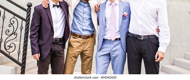 Groom With Best Man And Groomsmen At Wedding