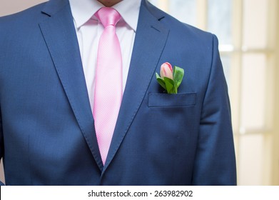 Groom In Blue  Tuxedo With Boutonniere With Tulip 