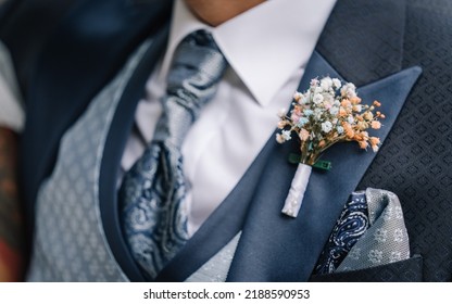 Groom With The Flower Hanging On The Lapel