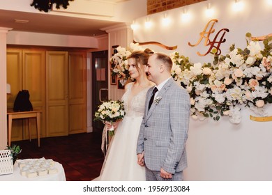 Groom In A Gray Suit And A Beautiful Tall Skinny Bride At The Ceremony, Photozone Banquet