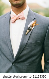 gray suit coral tie