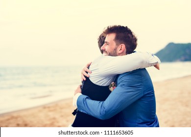 Groom And Groomsman At The Beach