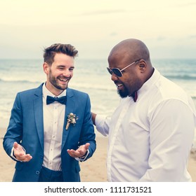 Groom And Groomsman At The Beach