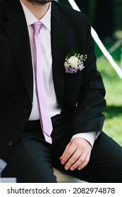 black suit with light purple tie