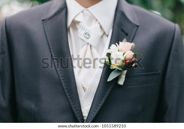 bridegroom suit flower