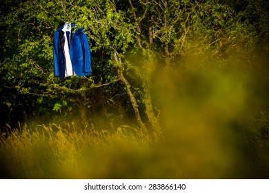 Groom Suit Hanging From A Tree