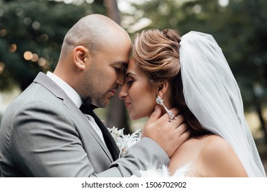 white groom suit with bride