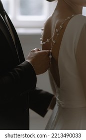 The Groom Touching The Back Of The Bride. Closeup Bride And Groom Portrait. Wedding Couple. Goosebumps Appeared On Body Of A Young Bride.