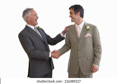 Groom And Usher Shaking Hands, Smiling At Each Other, Side View, Cut Out