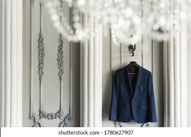 Groom's Suit Hanging On A Hanger