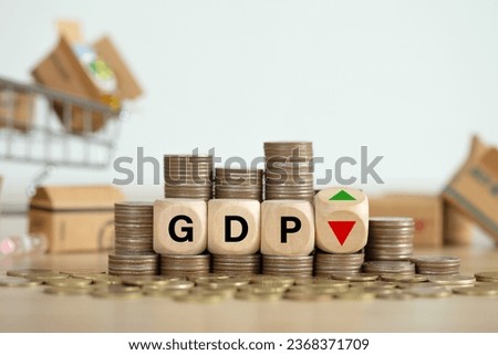 Gross domestic product concept.GDP block on Coins stack and UP and Down arrow symbol icon. monetary policy, Financial, Management, Economic, Inflation, Business and growth of GDP [[stock_photo]] © 