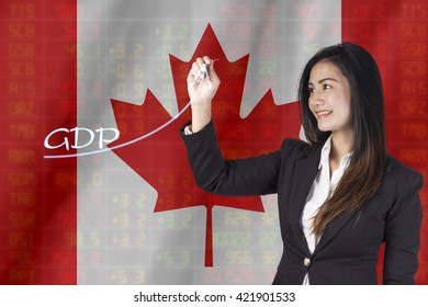 Gross Domestic Product (GDP) Improvement Concept. Businesswoman Draw Accelerating Line Of Growing Gdp.on Canada Flag Background