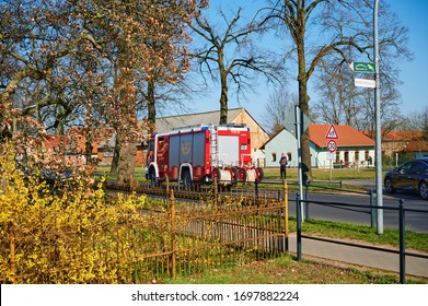 Grossziethen, Germany - April 6, 2020: Fire Engine Of The Volunteer Fire Brigade On The Way To A Deployment Site.