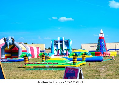 Grossziethen, Germany - September 1, 2019: Playground with bouncy castles on a meadow to romp for children in the countryside of Berlin.