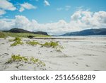 Grotlesanden Beach in Grotle, Norway, ocean, sandy shores, mountains.