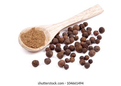 Ground Allspice On Wooden Spoon