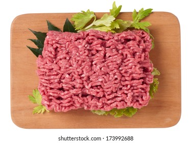 Ground beef on wooden board