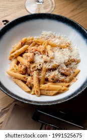 Ground Beef Pasta With A Big Pile Of Grated Parmesan, Rustic Italian Restaurant, Vintage Atmosphere