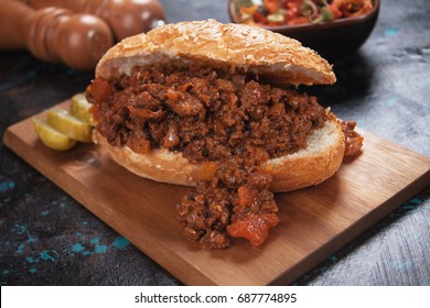 Ground Beef Sandwich Served On Wooden Board