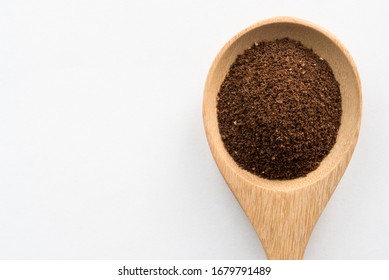 Ground Cloves On A Wood Spoon