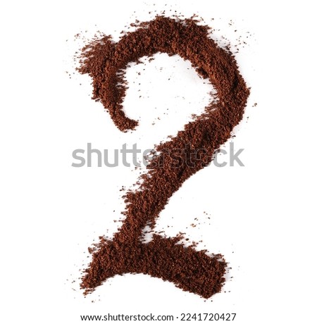 Ground coffee in shape number 2, two isolated on white, clipping path