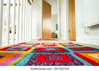 Ground level, shallow focus of a newly installed loft conversion showing the colour rugs. Leading to a distant bedroom. - Shutterstock ID 2017622765