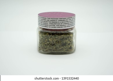 Ground Marijuana In A Jar With Warning Labels