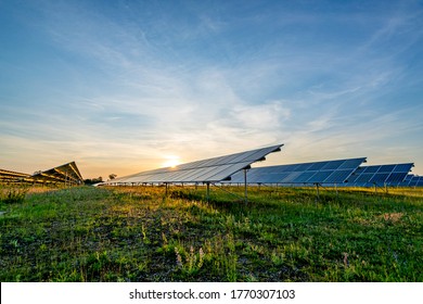 Ground Mounted Photovoltaic Power Station At Sunset