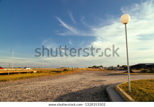 Ground roads with a street lamp in the direction of\
a road