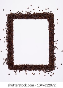 Ground roasted coffee frame. The square frame of grinded coffee powder isolated on white background with copy space in center. Organic frame background. Food texture, vertical