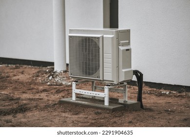 Ground Source Heat Pump Unit. Heat pump on the ground. Heat pump - the efficient source of heat. Sustainable future heating. - Shutterstock ID 2291904635