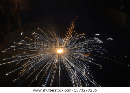 Ground spinner chakra Firecracker firework Diwali festival photography background wallpaper