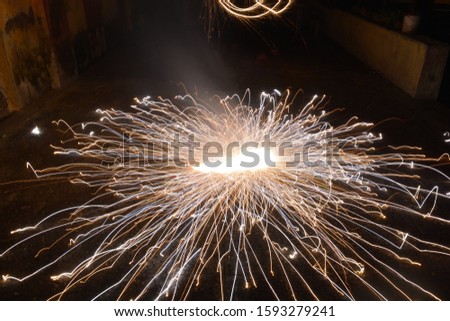 Ground spinner chakra Firecracker firework Diwali festival photography background wallpaper