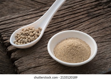 Ground White Pepper In White Bowl On Wooden Table