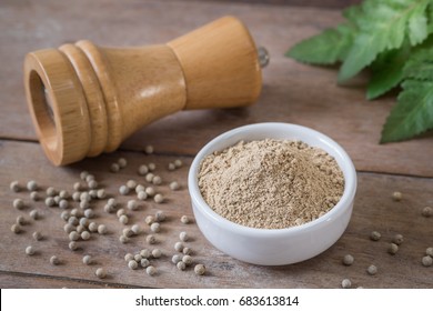 Ground White Pepper In Bowl And Pepper Shaker