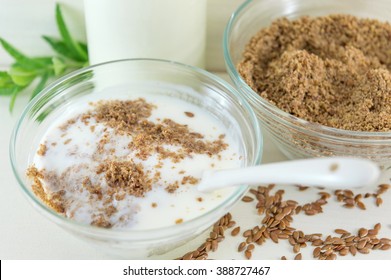 Grounded Flaxseed With Milk In A Bowl