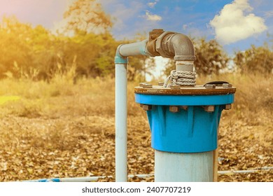 Groundwater wells are drilled and water is supplied with PVC pipes, groundwater pumping systems are powered by electricity to solve drought problems. - Powered by Shutterstock